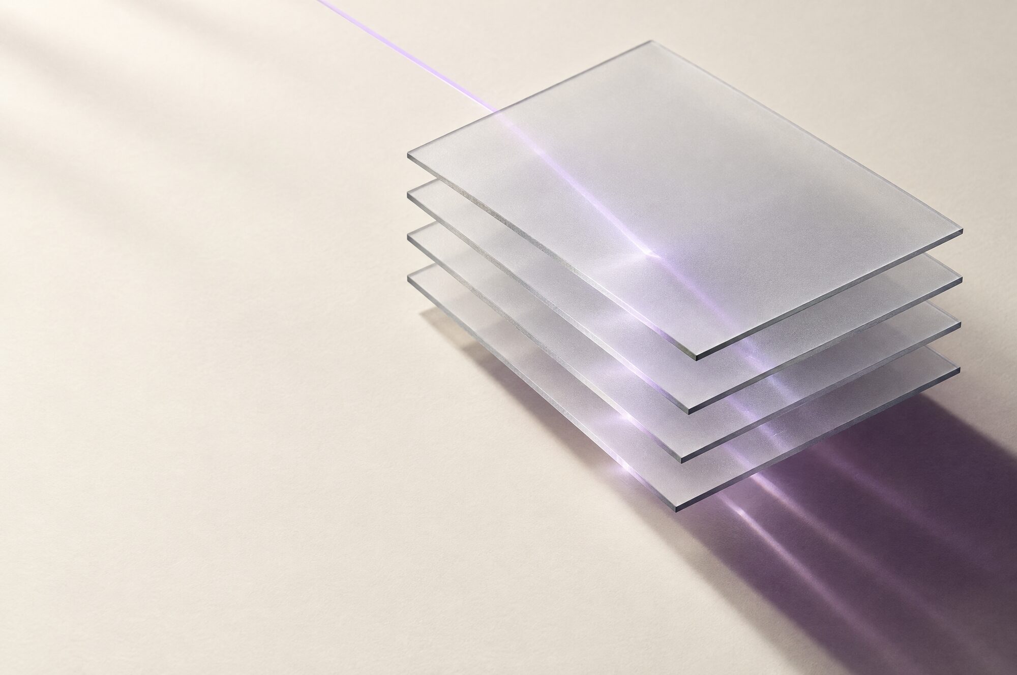 Translucent sheets stacked like protocol pages, with a fine lavender line of light passing through them